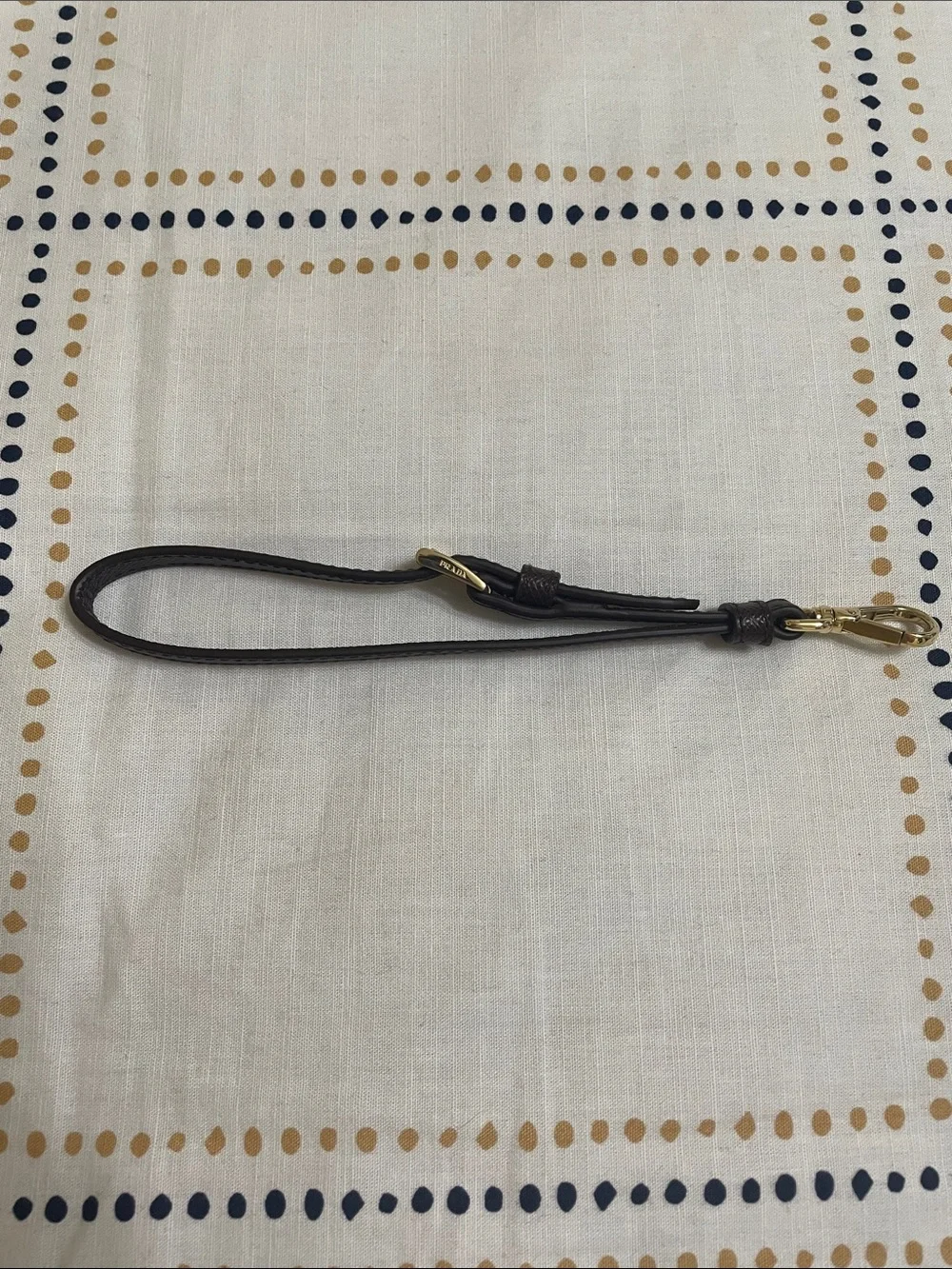 Prada burgundy Leather Wristlet Strap with Gold Hardware